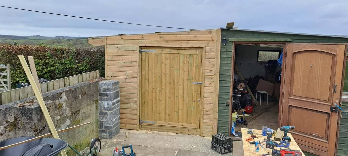 Completed bespoke garden shed by Gilbert And Son Fencing, North Devon