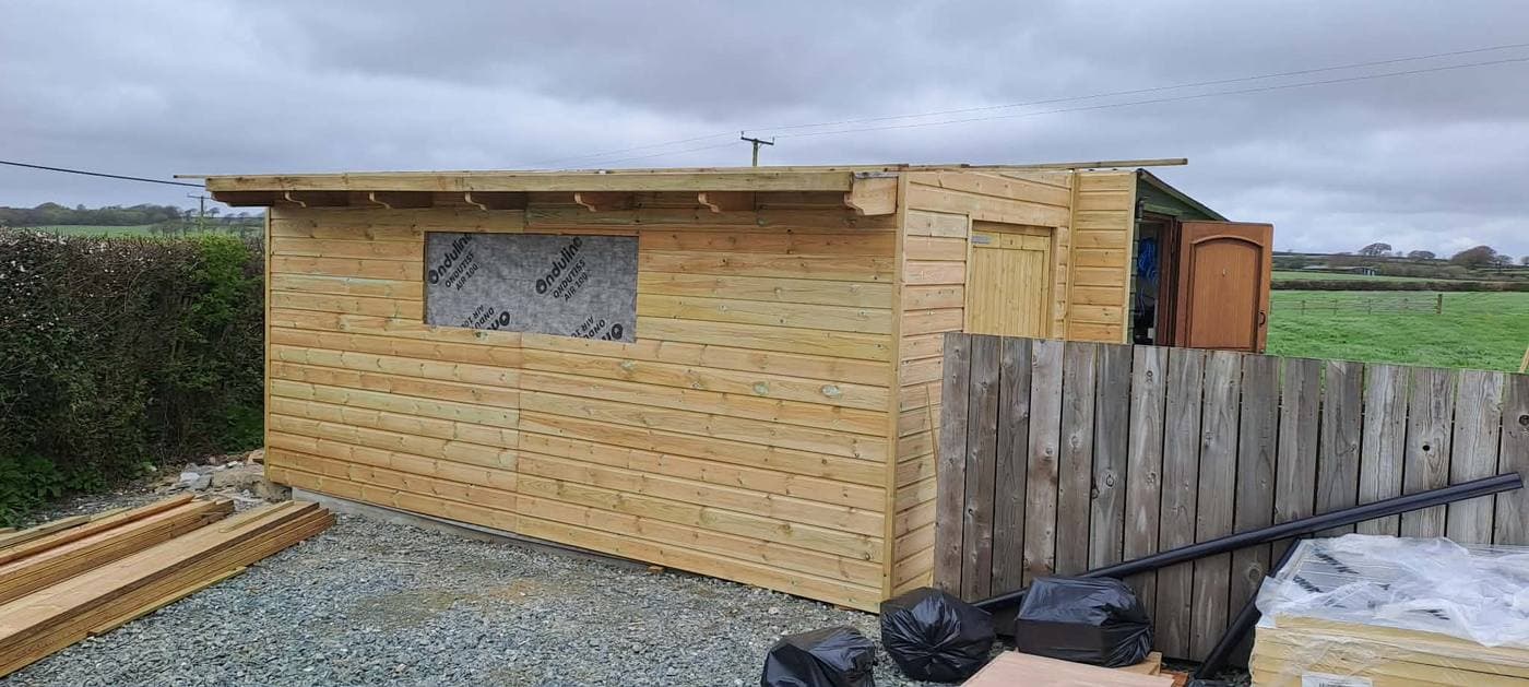 Completed bespoke garden shed by Gilbert And Son Fencing, North Devon